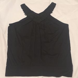 Isabella Rodriguez sleeveless black top